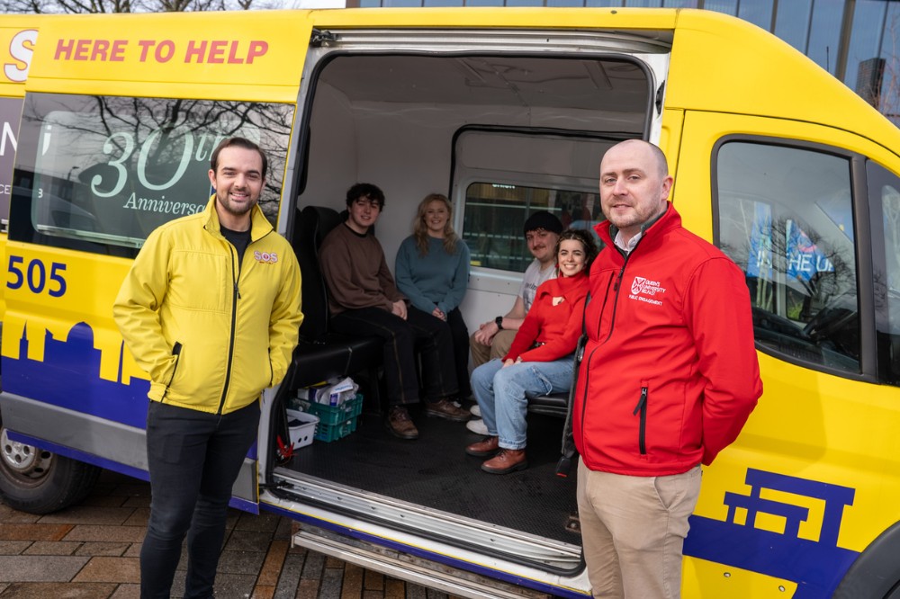 SOS Bus NI volunteers and partners at the bus